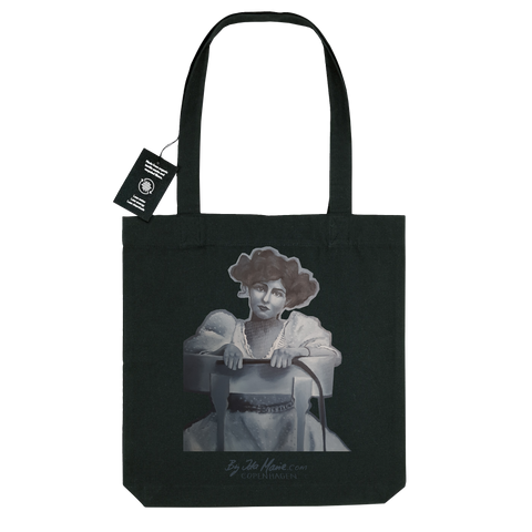 Black canvas totebag with oil painting illustration of a woman with a whip sitting on a chair by Ida Marie